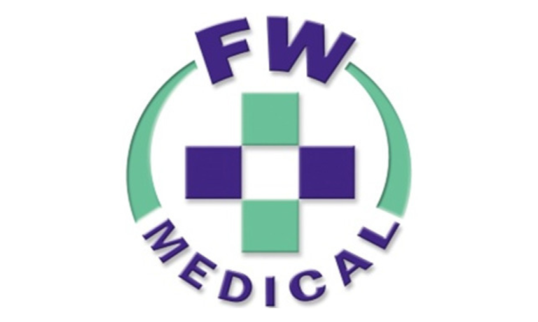 A logo featuring the letters "FW" in a bold, uppercase, sans-serif font style, positioned within a circle. The letters are dark purple. The circle is outlined with a light, mint green, curving line. Inside the circle, a stylized medical cross is depicted, formed by a grid of light mint green and dark purple squares. The medical cross is centred. Below the circle, the words "MEDICAL" are written in a dark purple, slightly stylized sans-serif font. The words are positioned around the bottom portion of the circle's perimeter.