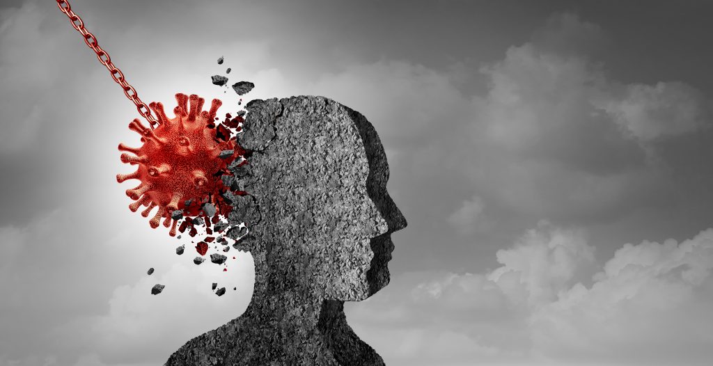 A virus, attached to a chain, smashes into a stone-like human head, symbolising the destructive impact of disease on mental health.